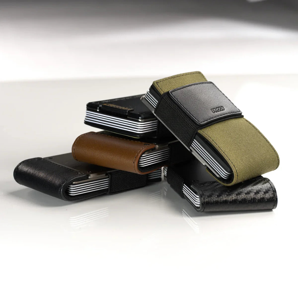 a pile of slim minimalist wallets