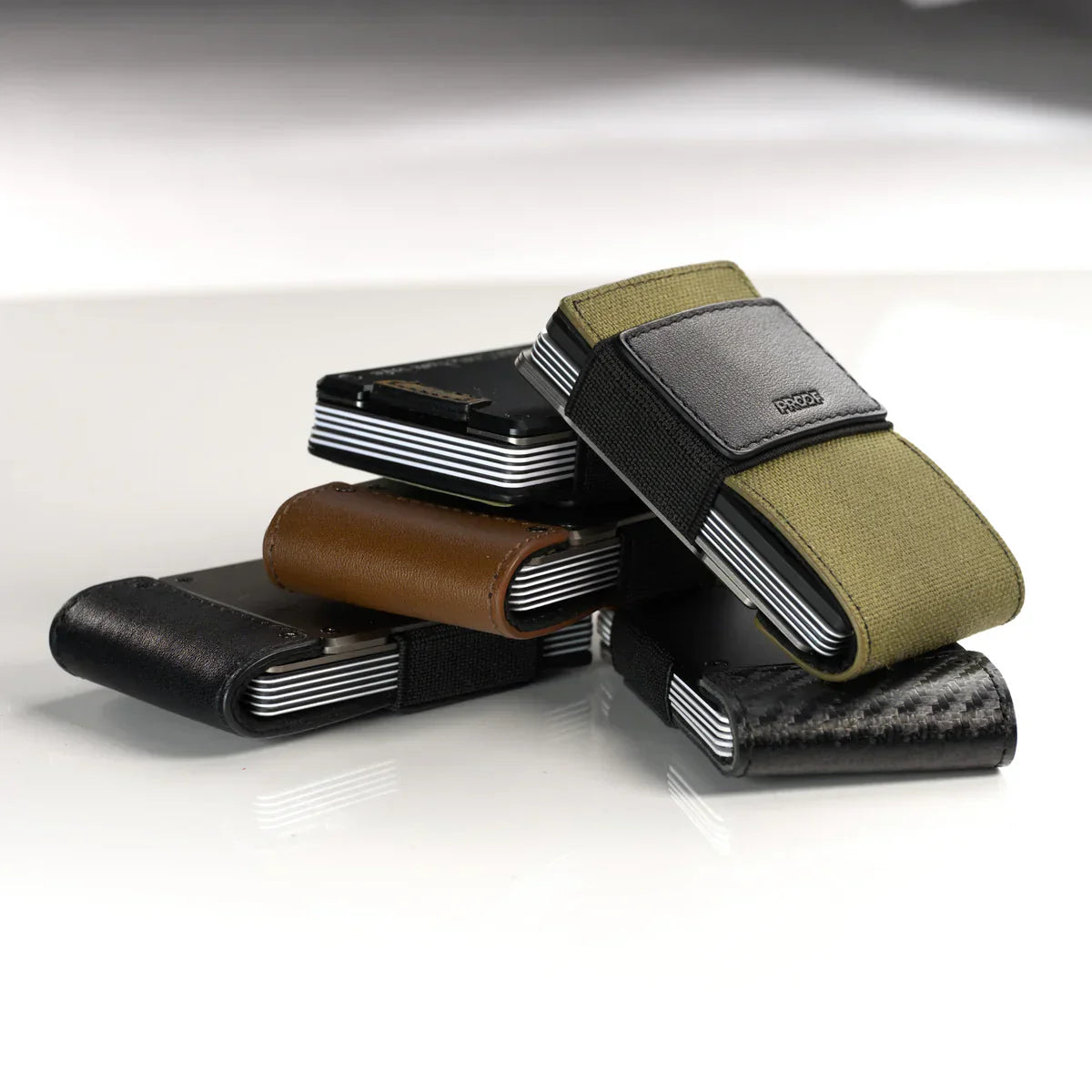 a pile of slim minimalist wallets