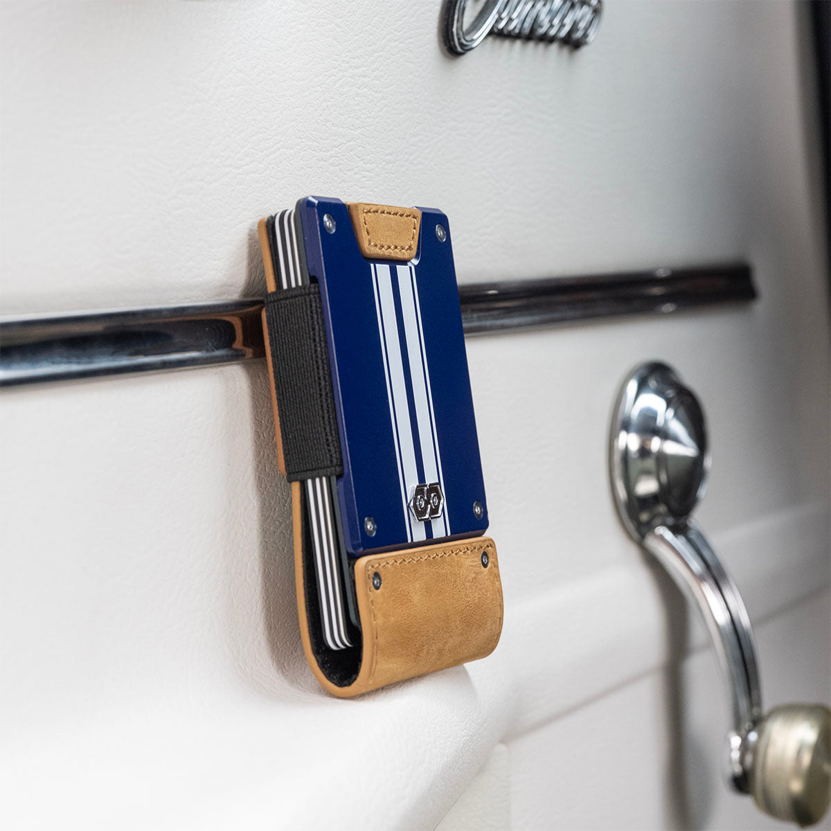 PROOF Octane minimalist wallet resting on the door of a 1969 Camaro Z10