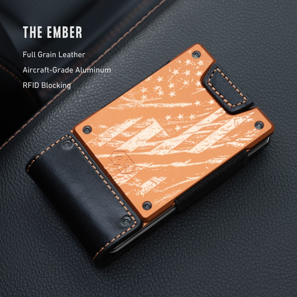 orange metal and black leather minimalist wallet with a laser etched distressed flag engraving