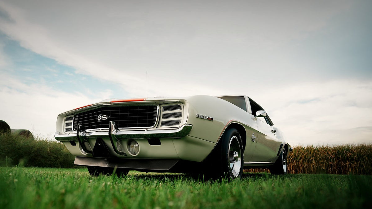 Low-angle view of the Camaro Z10 in a field