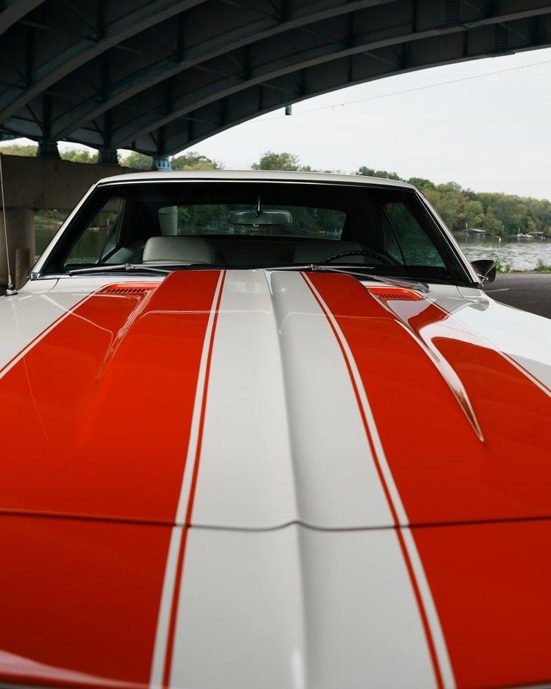 Cowl induction hood with twin Hugger Orange stripes